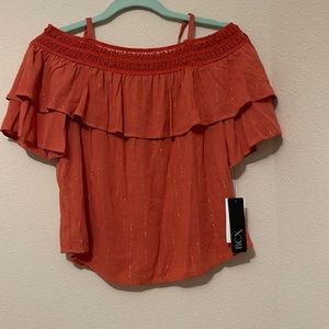 New BCX orange shirt from Macy’s. New & size is small.